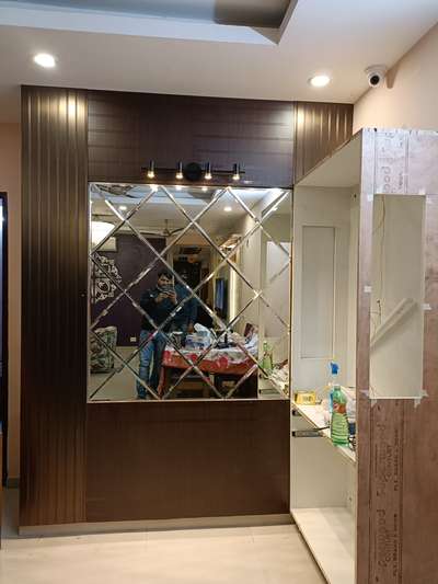 Glass design with charkool seat drawing room wall