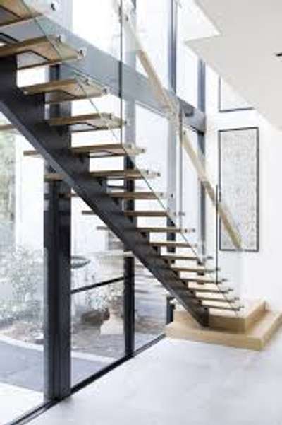 duplex stairs with glass railing
 #metal
 #TATA_STEEL 
 #metalstair