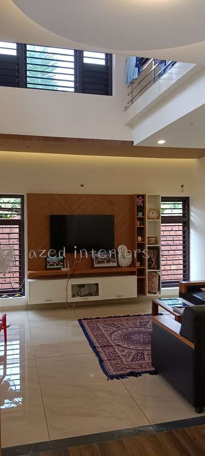 completed project
#nteriordesigner #Architectural&Interior #interiorcontractors #LivingRoomTVCabinet #partitiondesign  #Modularfurniture #modularkitchenkerala