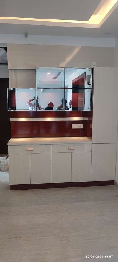 Crockery unit
It's made up with HDMR board, century laminate, hetch hardware, tinted glass, jaguar lights, Havells wire, composit murble and best labour.
We are giving best price.
Contact us for more details 9891949594