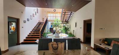 #Doctors residence at Palakkad  #4500 Sq.ft house  #wooden staircase  #bay window   #courtyard