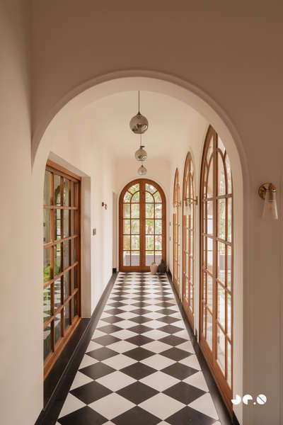 Arcade – Where arches, light, and landscape converse, and tradition finds a quiet 
contemporary soul.
Clients : @aarcha_vinod @ramvinodk 
Area: 4488 Sq.ft
Location: Bharanikavu, Kollam, Kerala.
Principal Architect/Designers: @ar.jun_v_a @_ar_anoop @ananthansurendran 
Interior Styling: Adheena Baburaj @dhii_design_studio 
Photography: @iksha.in #architecturedesigns  #KeralaStyleHouse  #TraditionalHouse  #interiordesignerkerala  #Architectural&Interior   #architectsinkerala