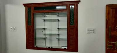 Showcase with sliding glass