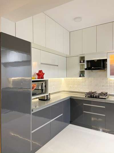 Grey colour lovers here are some aesthetic colour combinations for You.
 #KitchenIdeas  #ModularKitchen  #grey  #LargeKitchen  #LShapeKitchen  #trendingdesign