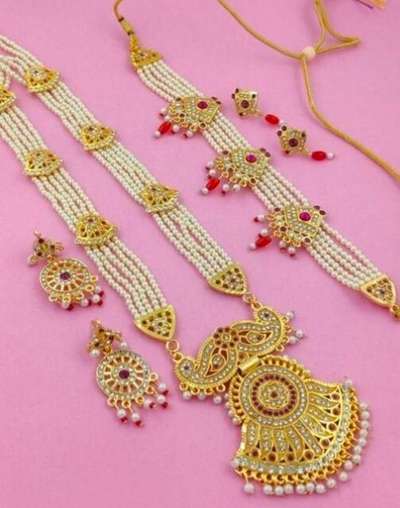 Rajputi Jewellery Set 
Name: Rajputi Jewellery Set 
Base Metal: Alloy
Plating: Gold Plated
Stone Type: Pearls
Sizing: Adjustable
Type: Necklace and Earrings
Net Quantity (N): 1
Ranihar combo offer for women jewellery set with earrings and chick set with earrings high gold plated premium quality 
Country of Origin: India6350495949