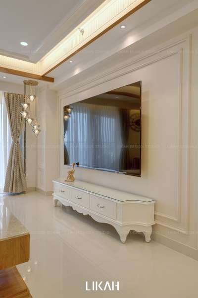 This bespoke TV wall design, paired with a classic console unit and warm ambient lighting, transforms the living space into a serene yet luxurious retreat. Crafted with attention to detail, it reflects the essence of refined living.


#InteriorDesign #Architectural&Interior  #Construction #Landscape #TransformYourSpace #home #dreamhome #transformyourspace #luxurious #luxuryinterior #luxuryinterior #luxuryvilla #tvunit #keralaphotography  #interior_and_living
