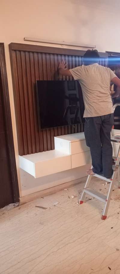 modern TV cabinet
polish and laminate
any furniture work requirement to contact me 
mob 9310666912
 #ModularKitchen  #MovableWardrobe  #silicate_polish  #LivingRoomTVCabinet