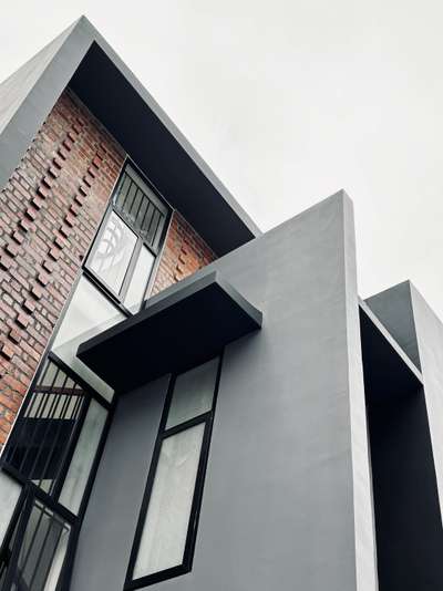 A compact urban residence defined by exposed brick, clean grey volumes, and bold geometric lines. A warm, contemporary home crafted for seamless city living.
Client: Staish Madhavan | 1530 sqft | 4 Bedroom Residence
#Architecture #ResidenceDesign #ContemporaryHome #BrickFacade #ModernArchitecture #UrbanLiving #ArchitecturalDesign #MinimalDesign #koloprojects