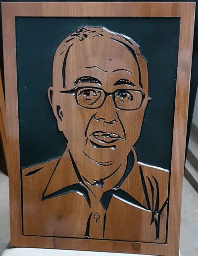 photo carving services done in solid wood.