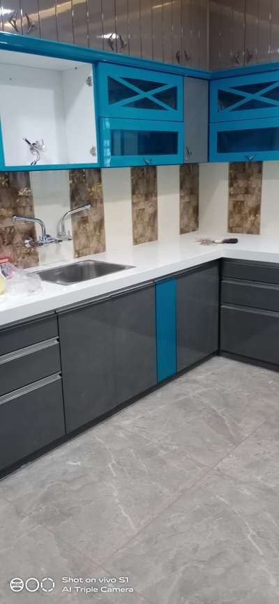 *kitchen fitting*
8000se 15000 charges labour 
Miter design kitchen