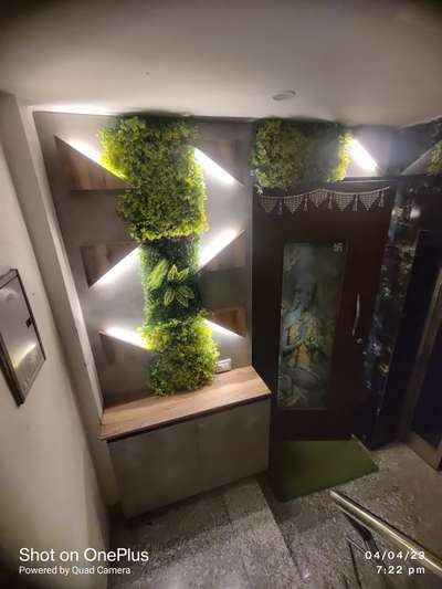Entrance design concept with vertical garden and profile lights