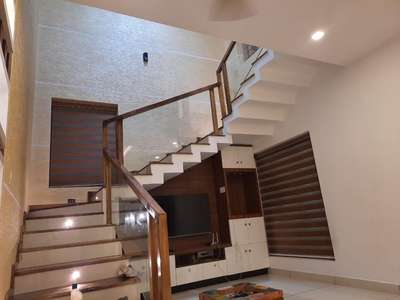 stair room design with Tv unit