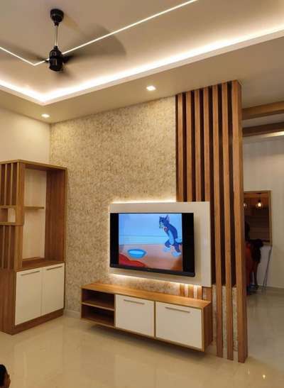 #Tv unit
Designer interior
9744285839