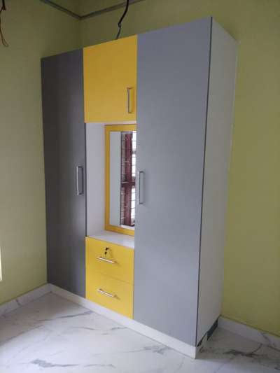 A Simple Wardrobe with Yellow and grey combination...
