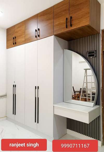 #4DoorWardrobe  #WardrobeIdeas  #WardrobeDesigns  #HomeDecor  #homeowners #HouseDesigns