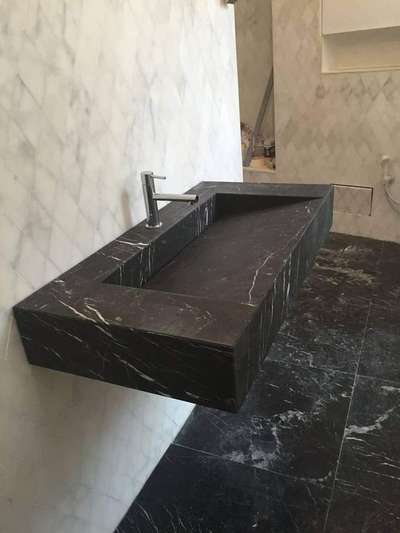 washbasin made by tiles

contack 9694903169