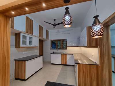 wooden and white combo mica finished kitchen  #KitchenIdeas  #LShapeKitchen  #InteriorDesigner  #FalseCeiling  #BedroomDecor  #LivingroomDesigns  #dining  #WALL_PANELLING  #ModularKitchen  #WardrobeIdeas