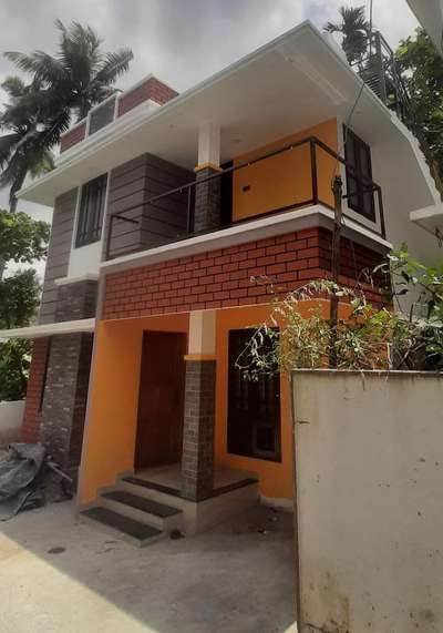 1050 Sqft. 3 bhk house just 2 cent Land.