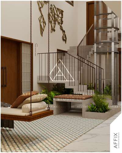A thoughtfully designed double-height stair area that blends modern sophistication with inviting comfort. The suspended wooden swing with layered cushions adds a cozy touch, complemented by patterned floor tiles that introduce texture and charm. A sleek staircase with a glass lift forms the architectural centerpiece, while the sculptural metal wall art adds a bold design statement. Subtle greenery softens the space, bringing in freshness and a natural balance to the contemporary aesthetic. #Architect  #architecturedesigns  #Architectural&Interior  #kerala_architecture  #best_architect   #StraightStaircase  #hallspace
