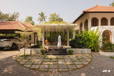 Arcade – Where arches, light, and landscape converse, and tradition finds a quiet 
contemporary soul.
Clients : @aarcha_vinod @ramvinodk 
Area: 4488 Sq.ft
Location: Bharanikavu, Kollam, Kerala.
Principal Architect/Designers: @ar.jun_v_a @_ar_anoop @ananthansurendran 
Interior Styling: Adheena Baburaj @dhii_design_studio 
Photography: @iksha.in #architecturedesigns  #Architectural&Interior  #TraditionalHouse  #KeralaStyleHouse  #architecturekerala