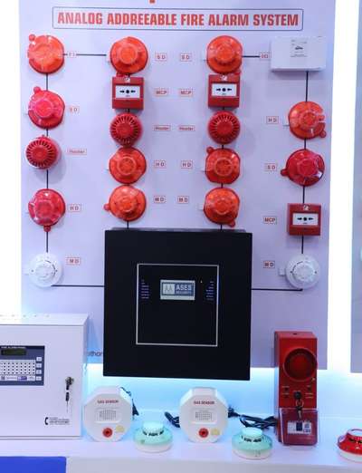 *Fire Alarm system with Smoke Detactor MCP hooter*
Fire Alarm System 

It warns people when fire, smoke, carbon monoxide or any other fire related emergencies are detected. 

Basically fire alarms are of two types: photoelectric  and ionisation. The way they sense the presence of smoke is different for each type. Flaming fire produces different type of smoke than smoldering fire.

 Ionisation Detectors contain tiny traces of radioactive  material between two electrically charged plates.Whenever  the flow of ions is disrupted by smoke particles , the smoke detector goes off. In case of photoelectric Detectors Led light beams are emitted in the detection .When smoke particles come into this chamber, they scatter the beam  of light which the sensor detects and alarm goes off.

A fire alarm system not only protects your property but also its occupants from the danger of fire. This is done by detecting fire, alerting occupants, managing risk
and notifying the fire department.

These systems use a network of appliances , control panels and devices to perform the above mentioned functions. 

The fire alarm system needs proper maintenance, testing and inspection  from time to time so that it functions properly.