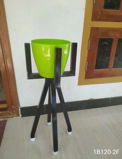 METAL STAND FOR INDOOR PLANTS.
 
Durable, Eco friendly. Rest free, Not harmful for any floor, Adjustable legs for leveling.