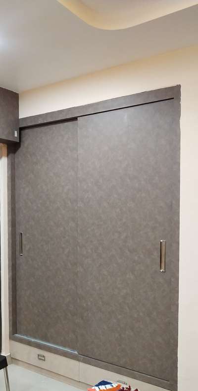 wardrode Slidding with world class haffele hardware fitting inner lamimate finish outer laminate up to 1500/- per sheet. and handle up to 700/- total with material 1350/- per sqft