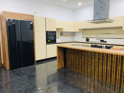 Converting an Old Kitchen to a Beautiful Island Modular Kitchen. Completed Renovation Project @Kolappuram.

#glasskitchen #Toughened_Glass 
#KitchenRenovation #renovatehome #glossykitchen #HouseRenovation 
#ModularKitchen #modernkitchens #modernkitchendesign #ModularKitchen #factorymadekitchen #factoryfinished #ownfactory #factorykitchen #OpenKitchen #beautifulkitchen #bestkitchen  #royalkitchen #OpenKitchen #glasskitchen #lacqueredkitchen #lacqueredglass #KitchenTable #KitchenInterior #KitchenIdeas #SmallKitchen #KitchenDesigns #KitchenCabinet #LargeKitchen 
#BedroomDecor #KingsizeBedroom #InteriorDesigner #Architectural&Interior #MasterBedroom #BedroomDesigns #beatuifuldesign #beautifulhomedesigns #beautifullight #profilelights #Toughened_Glass #glasswardrobe #corian #coriancountertop #romanblinds #dressinginterior #dressingunit #interiordesign #interiordesignkerala #girlsroom #TexturePainting #bigrooms #BedroomIdeas #islandkitchen