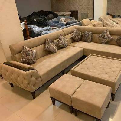 L shape sofa 3+3.   1 centre table 2 puffy 35k 5 year worrenty