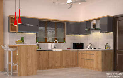 #interiordesigning

Contact no : 9846386941 

. proposed residence : maneesh

Designed by : EDEN DESIGNS

. Location 🚩 : kottayam

#modernkitchen , #kitcheninterior , #KitchenCabinet #kitchen3d  #breakfastcounter #KitchenIdeas