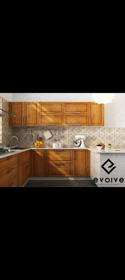 Evolve Interiocrat has masterfully created a kitchen design that exudes luxury!! 

With their skillful touch, the kitchen becomes more than just a functional space, it becomes a statement of refined taste and impeccable design🪄💗

Each detail is meticulously curated, from the deep, regal hues adorning the cabinetry to the luxurious accents that punctuate the space🌟

#luxuryliving
#interiordesignexcellence
#timelesselegance
#innovativedesign
#dreamhome
#interiorinspiration
#homedecor
#craftsmanship
#designgoals
#interiordecor
#homedesign
#creatingbeautifulspaces
#styleandsubstance
#highendliving
#masterpiece
#creativespaces
#modernluxury
#elegantinteriors