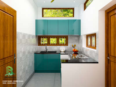 Modern teal‑cabinet kitchen with glass cooktop & fresh window view. 🌿 

Client : Dennis Sajan 
Area : Kitchen work Area