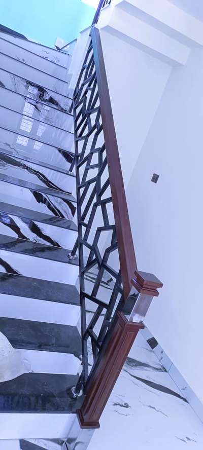 CUSTOMIZED GI WITH TEAK WOODEN HANDRAILS 

#HouseDesigns #GlassHandRailStaircase #handrailsforkings #handrails #handrailsteel #handrailing #StaircaseHandRail #handrails