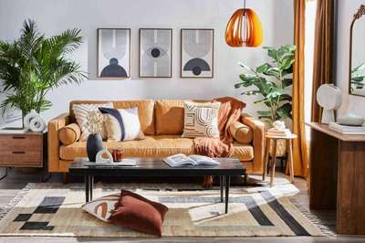 Use rich shades of brown with abstract wall and table decor to curate this look. Cleancut lines and comfortable seating come together to bring about a cozy feel to the space. Brown adds to the warmth of the space.
#interior #decor #ideas #home #interiordesign #indian #colourful 
#decorshopping