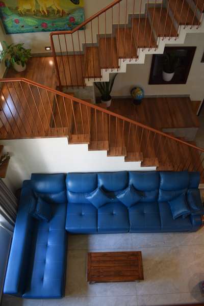 Living room and staircase 
#LivingroomDesigns #LivingRoomTable #budgethomes 
#KeralaStyleHouse #architecturekerala