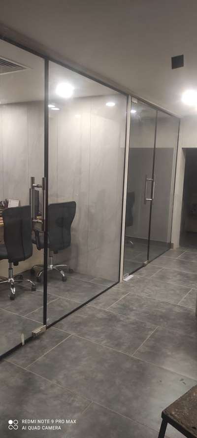 office glass partition with black profile..