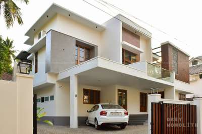 Completed 5 BHK Residential Project at Kannur, with a built-up area of 2980 sq.ft in a plot of 9 cents. #architecture #Minimalistic #FlatRoof  #design #art #5BHKHouse #ContemporaryHouse #interiordesign #architecturephotography #architect #interior #building #arquitectura #archilovers #architecturelovers #architecturekerala #kannurarchitects #keralaarchitects #keralahomedesign #khd #SlopingRoofHouse #Kannur