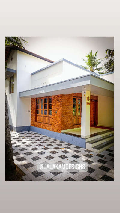 Completed Project at Kariyavattom, Trivandrum.  #architecturedesigns  #completed_house_construction  #keralaarchitectures  #indiadesign   #Architect  #TeakWoodDoors