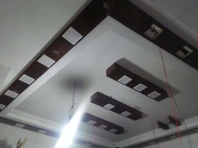# false ceiling with wooden panel mate
