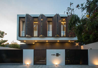 #FamilyHouse at Nại Hiên Đông, #Vietnam 
Architects: 85 Design
Lead Architect : To Huu Dung
Area : 230 m² (Approx. 2500 S.Ft)
Year : 2020


Adjustable sun louver system is a feature which makes great productivity against the heat and saves electricity in tropical regions. All the rooms are directly full of light and wind.

Kitchen has a great importance in the design, which is at the back along with a small garden. All activities in these spaces are connected to the garden by the mobility of sliding doors, creating the feeling as if these spaces are a unified and private one. Apart from that there ara playing, reading and relaxing area for the #family.

#WorldArchitecture

#SunLouver #ClimateResponsive #ClimateDesign #PassiveCooling #ClimateArchitecture #TropicalClimate #Environmental #ClimateAdaptive #NaturalLight #Wind #ActivitySpaceRelation  #Minimalistic #SpaceSaver #Residential #Sleek #FloorPlan #Architecture #Design #InteriorDesign #Landscape #Garden