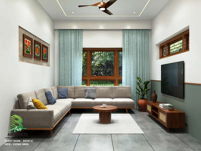 A warm and contemporary living area designed with clean lines, earthy tones, and thoughtful detailing ,
a space where comfort meets elegant modern living.

 Client: Arun AJ | View: Living Area