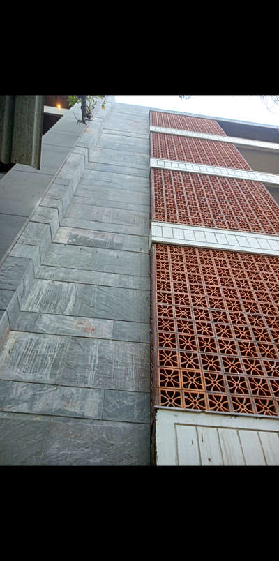 clay tile on balcony
and stone on wall elevation  
 #stonework  #claytile 
 #ElevationDesign