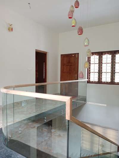 Teak wood Hand railing work on glass