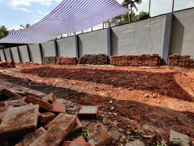 Laying 60mm interlock flooring at Mallikadavu Govt ITI Boys Hostel, Kozhikode