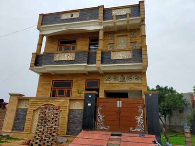 teak stone elevation elevation elevation and stone jali