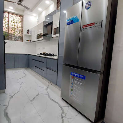 Modular kitchen by Rishi Home Interior