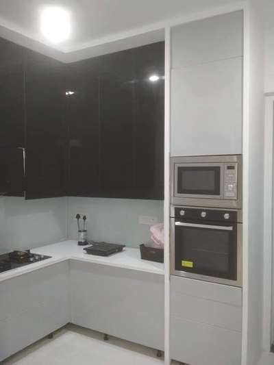 Acrylic finished Kitchen #ModularKitchen #Acrylicfurniture #moderinteriors