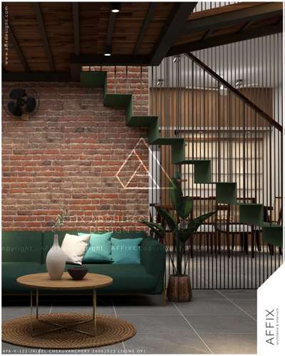 "Bringing elegance and practicality together in this budget-friendly single-story home 🏡✨ A vibrant green sofa stands out against the natural brick-designed wall, creating a cozy yet stylish focal point. The simple round wooden table with sleek golden legs complements the modern aesthetic. To make the most of the small plot area, we added a mezzanine floor above the living space and introduced sleek industrial stairs with open handrails to maintain an airy feel. Thoughtful design that balances functionality with style for Mr. Jaleel
's family home! #InteriorDesign #BudgetFriendly #MezzanineLiving #SmallSpaceDesign #elegantinteriors  #Architect  #architecturedesigns  #Architectural&Interior  #architectsinkerala  #best_architect  #LUXURY_INTERIOR  #StaircaseDesigns