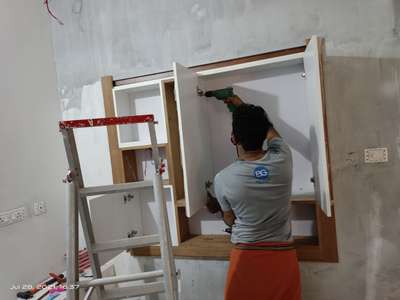 wall shelf design with crockery -is 710 grade ply with Lamination and veneer finish- Factory finished works