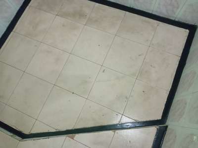 bathroom floor leakage probleam solution without tile remove